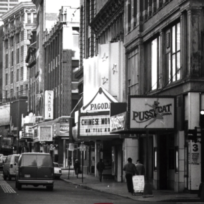 (8) In 1977, David Wong bought the old Center Theater (adult movies) and converted it to the Pagoda Cinema for Chinese movies despite its location between the Pussycat Lounge and the Naked I Cabaret. Boston Globe