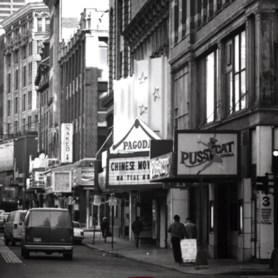 (8) In 1977, David Wong bought the old Center Theater (adult movies) and converted it to the Pagoda Cinema for Chinese movies despite its location between the Pussycat Lounge and the Naked I Cabaret. Boston Globe